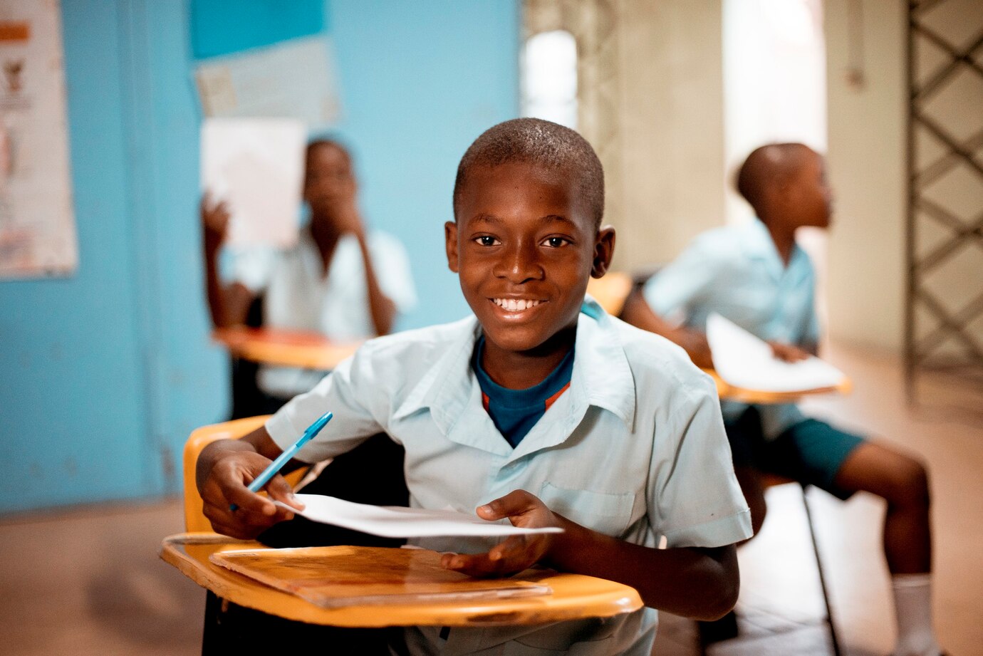 Smiling African boy in school uniform