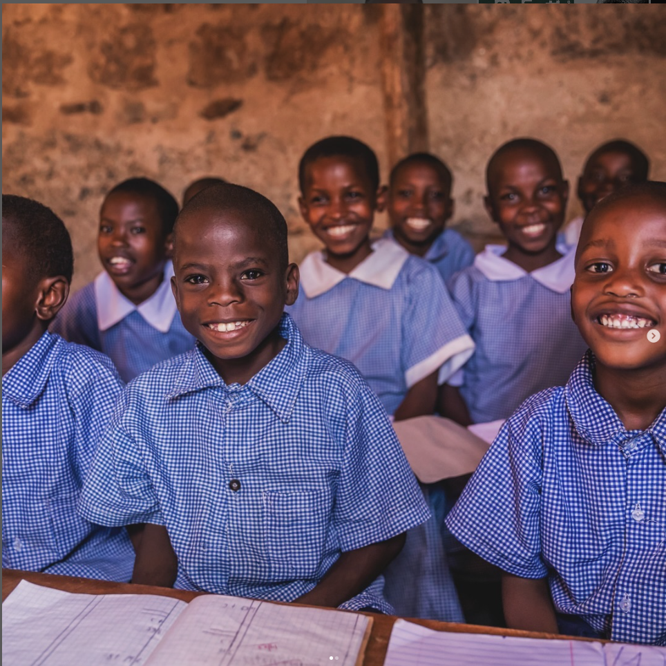 African child in classroom smiling